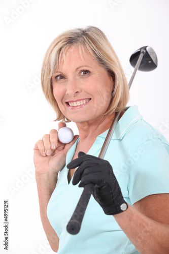 Photo: Mature female golfer Mature female golfer