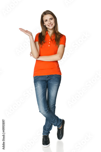 Photo: Full length of casual woman showing empty copy space Full length of casual woman showing empty copy space
