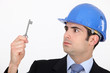 Man staring at a key