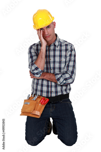 Photo: Stressed manual worker Stressed manual worker