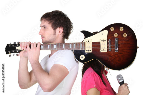 Photo: Boy with guitar over shoulder Boy with guitar over shoulder