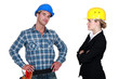 businesswoman and craftsman posing together