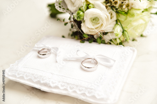 Photo: White Pad with Wedding Rings White Pad with Wedding Rings