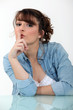 Woman shushing