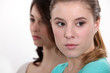 Downcast young women