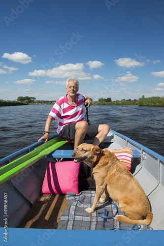 Photo: man in boat at the river man in boat at the river