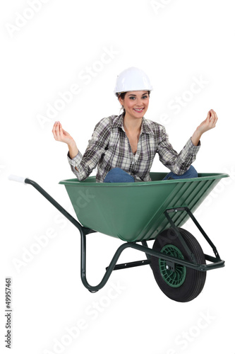 Photo: Female construction worker doing yoga Female construction worker doing yoga