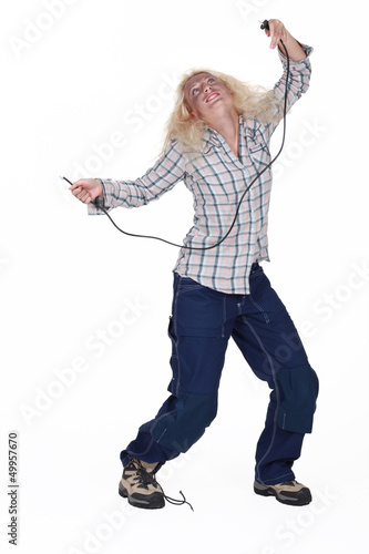 Photo: Woman suffering from electric shock Woman suffering from electric shock