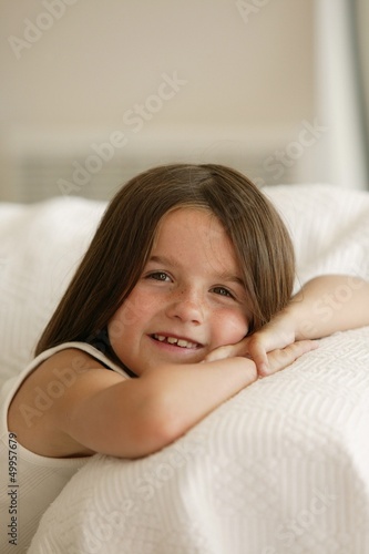 Photo: Little girl at home Little girl at home