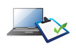 laptop and clipboard with checkmark
