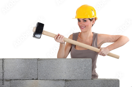 Photo: Woman with a sledge hammer Woman with a sledge hammer