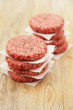 Raw burgers for hamburgers, in a pile