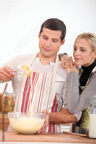 Photo: Couple cooking Couple cooking
