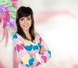 Photo: Attractive girl with sweater heart Attractive girl with sweater heart