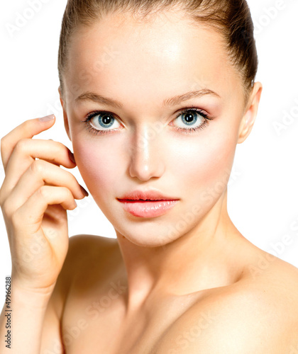 Photo: Beauty Teenage Girl Portrait isolated on a White Background Beauty Teenage Girl Portrait isolated on a White Background
