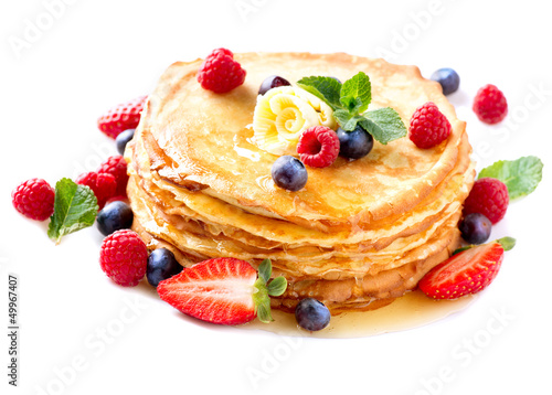 Photo: Pancake with Berries. Pancakes Stack over White Pancake with Berries. Pancakes Stack over White