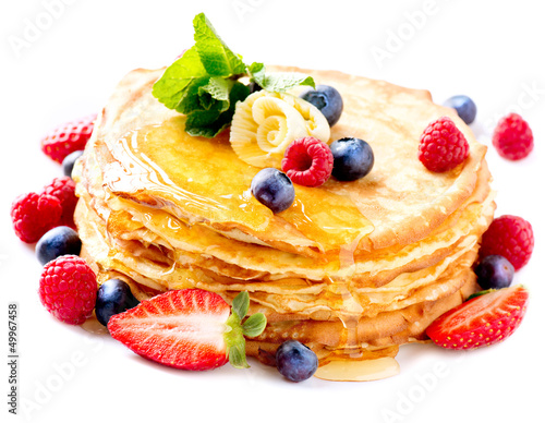 Photo: Pancake with Berries. Pancakes Stack over White Pancake with Berries. Pancakes Stack over White