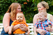 Mother and grandmother with children in a park
