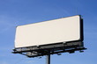 Empty billboard on cloudy sky.