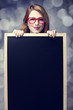 Redhead student with blackboard.