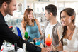 Happy Friends Drinking at Bar