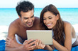 Happy Couple With Digital Tablet
