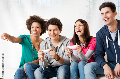 Photo: Friends Playing Video Games Friends Playing Video Games