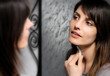 brunette girl cleansing skin face
