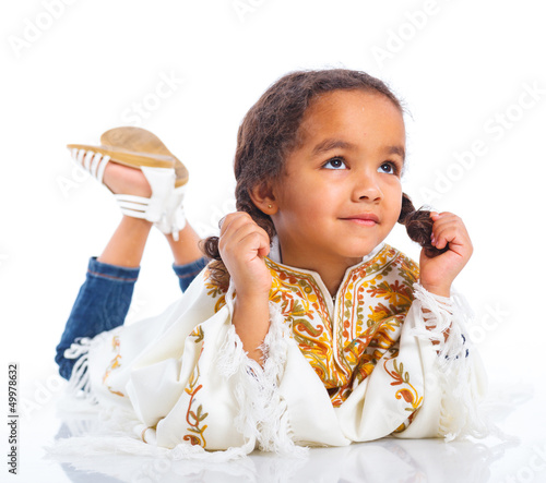 Photo: Girl lying and smiling Girl lying and smiling