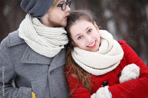 Photo: Young couple dressed in winter clothes Young couple dressed in winter clothes