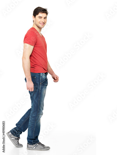 Photo: Full portrait of smiling walking man Full portrait of smiling walking man