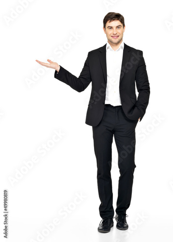 Photo: man shows something on arm isolated on white man shows something on arm isolated on white