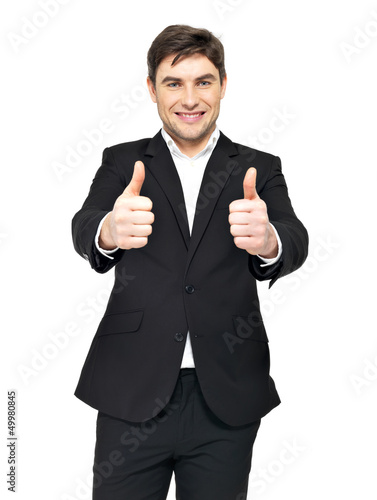 Photo: Happy businessman shows thumbs up Happy businessman shows thumbs up