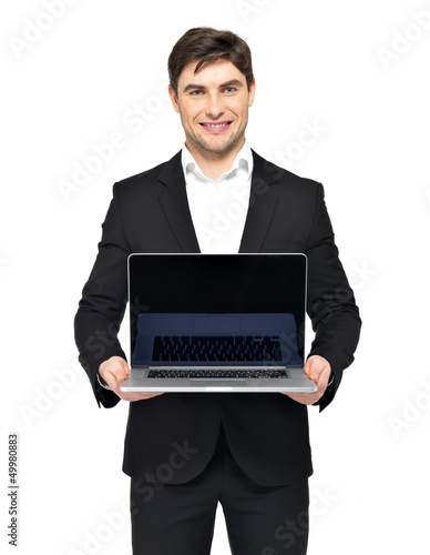Photo: happy businessman holds the laptop happy businessman holds the laptop