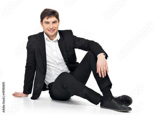 Photo: businessman sitting on the floor businessman sitting on the floor