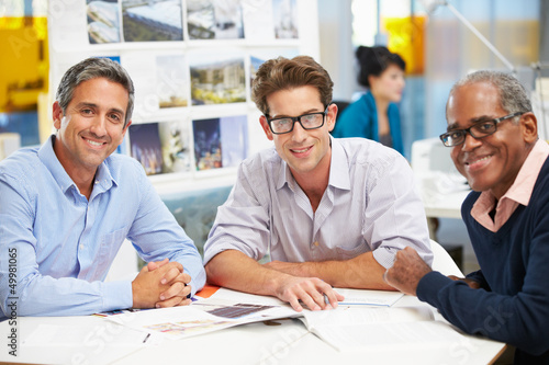 Photo: Group Of Men Meeting In Creative Office Group Of Men Meeting In Creative Office