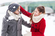 Foto: Couple playing in snow Couple playing in snow