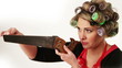 Housewife checks hand saw for honey husband