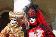 Venetian costume attends Carnival of Venice.