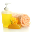 Bottle, soap and towel, isolated on white