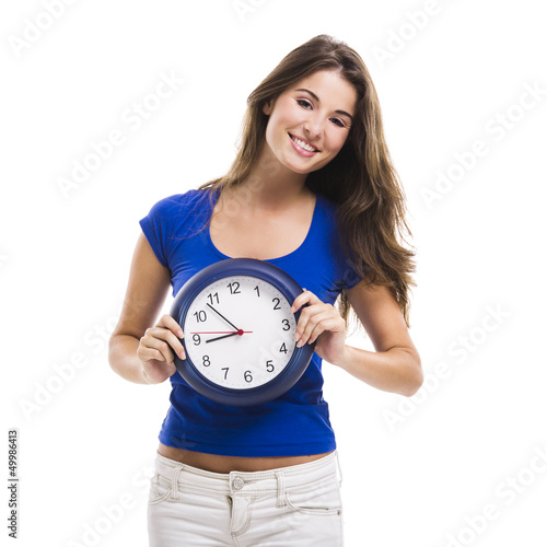 Photo: Beautiful woman with a clock Beautiful woman with a clock