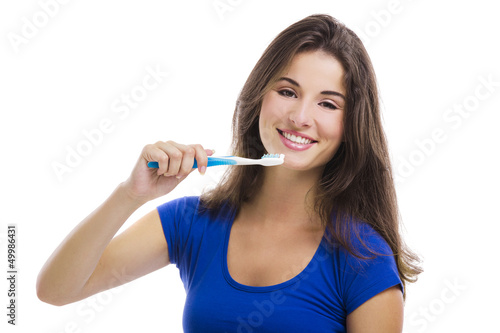 Photo: Beautiful woman with a toothbrush Beautiful woman with a toothbrush
