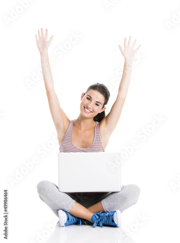 Photo: Happy student with a laptop Happy student with a laptop