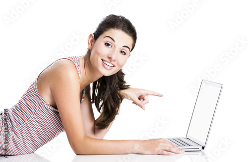 Photo: Pointing to a laptop Pointing to a laptop
