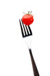 Foto: Close up of red tomato on the fork, isolated on white Close up of red tomato on the fork, isolated on white
