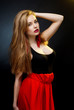 Photo: art fashion photo of young woman on dark background art fashion photo of young woman on dark background