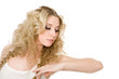 Charming thoughtful young blond girl