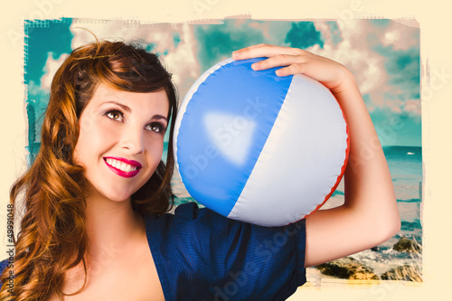 Photo: Vintage 1950 era pin-up woman with beach ball Vintage 1950 era pin-up woman with beach ball