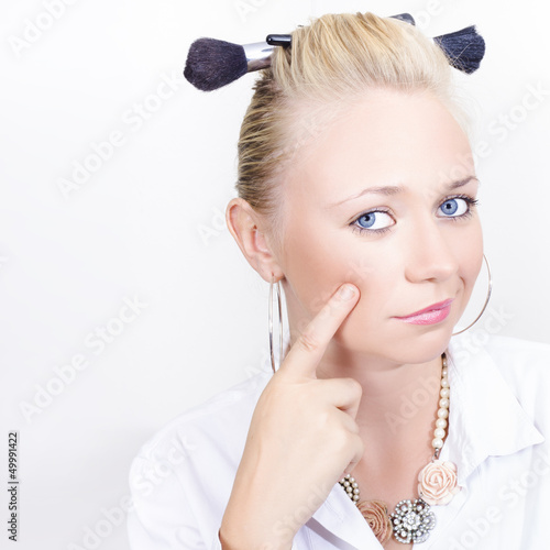 Photo: Face of a funny hair and make-up model Face of a funny hair and make-up model