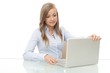 Young businesswoman opening laptop cover